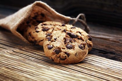 Chocolate cookies on wooden table. Chocolate chip cookies shot chocolate chip cookie recipe